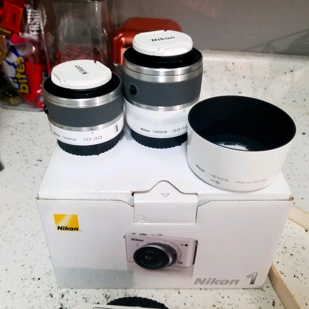 Nikon J1 camera with lenses
